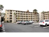 Three-story condo building with ample parking at 3682 Lake Bayshore Dr # K402, Bradenton, FL 34205