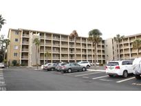 Three-story condo building with ample parking at 3682 Lake Bayshore Dr # K402, Bradenton, FL 34205