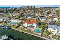 Luxury waterfront home with pool and dock; desirable location at 550 Yardarm Ln, Longboat Key, FL 34228