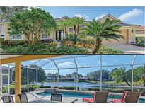 Single-story home with tile roof, landscaped yard, and two-car garage at 5655 Eastwind Dr, Sarasota, FL 34233