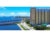 Aerial view of a luxury high-rise building near the water at 345 Bayshore Blvd # 706, Tampa, FL 33606