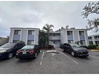 Two-story condo building with parking and landscaped grounds at 5310 26Th W St # 501, Bradenton, FL 34207