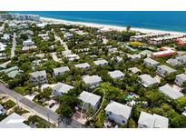 Aerial view of a beachfront property community showcasing a home with private parking at 6250 Holmes Blvd # 71, Holmes Beach, FL 34217