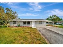 Newly renovated single story home with carport and large yard at 5411 16Th W St, Bradenton, FL 34207