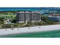 Luxury beachfront condo building with resort-style amenities and stunning ocean views at 415 L Ambiance Dr # C204, Longboat Key, FL 34228