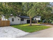 Newly renovated home with modern exterior and fenced yard at 3015 Hillview St, Sarasota, FL 34239