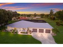 Luxury home on golf course with pool and three-car garage at 1655 51St W St, Bradenton, FL 34209