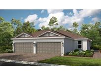 Two-car garage home with brown roof and landscaping at 8109 Moonbeam Ave, Sarasota, FL 34241