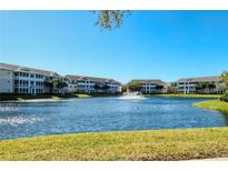 Beautiful lake view with fountain and lush landscaping in this multi-story condominium community at 4802 51St W St # 1118, Bradenton, FL 34210