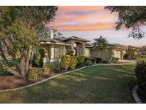 Attractive single-story home with landscaped yard and sunset view at 8818 29Th E St, Parrish, FL 34219