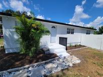 Newly renovated home with a fresh coat of paint and landscaping at 3611 3Rd S Ave, St Petersburg, FL 33711