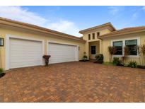 Two-car garage with paver driveway at 4839 Pastel Ct, Sarasota, FL 34240