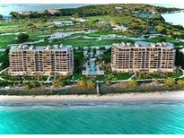 Luxury beachfront condo complex with ocean and golf course views at 415 L Ambiance Dr # A401, Longboat Key, FL 34228