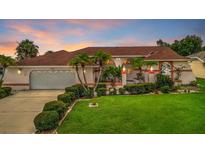 Attractive single-story home with a large yard and two-car garage at 26071 Paysandu Dr, Punta Gorda, FL 33983