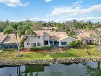 Aerial view of the property, showcasing its location and backyard at 4555 Forest Wood Trl # 23, Sarasota, FL 34241