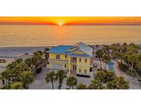 Beachfront home with pool and ocean views at sunset at 777 N Manasota Key Rd, Englewood, FL 34223