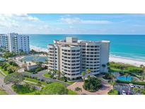 Luxury beachfront condo building with ocean and golf course views at 775 Longboat Club Rd # 304, Longboat Key, FL 34228