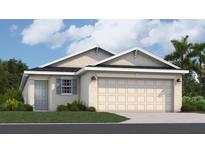 One-story home with gray siding, two-car garage, and landscaping at 9100 Tequila Sunrise Dr, Sarasota, FL 34241