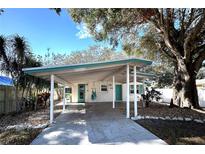 Cute bungalow with carport and landscaped yard at 970 S Allendale Ave, Sarasota, FL 34237