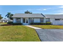 Front view of a single-story house with a well-maintained lawn at 3701 39Th W St, Bradenton, FL 34205