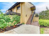 Condo entry with stairs and landscaping at 5612 Ashton Lake Dr # 5612, Sarasota, FL 34231