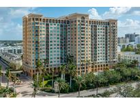 Elegant high-rise building with upscale finishes and landscaping at 750 N Tamiami Trl # 314, Sarasota, FL 34236