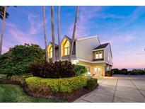 Stunning waterfront home with mature landscaping and a private driveway at 30 Tidy Island Blvd, Bradenton, FL 34210