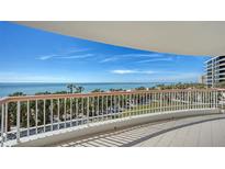 Stunning balcony view of the ocean and beach at 455 Longboat Club Rd # 305, Longboat Key, FL 34228