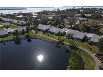 Charming lakeside community featuring well-maintained homes and lush landscaping, creating a serene living environment at 4431 Independence Dr, Bradenton, FL 34210