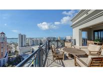 Spacious balcony with city and water views, perfect for outdoor entertaining at 50 Central Ave # 17Phc, Sarasota, FL 34236