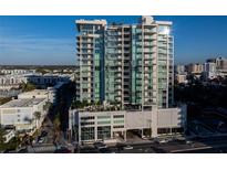 Modern high-rise building with city views and ample parking at 540 N Tamiami Trl # 802, Sarasota, FL 34236