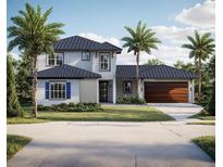 New construction two-story home boasting a metal roof, wood-look garage door and beautiful landscaping at 7808 20Th W Pl, Bradenton, FL 34209