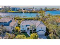 Luxury waterfront home with private dock and stunning canal views at 3371 Bayou Sound, Longboat Key, FL 34228
