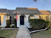 Inviting exterior featuring a well-maintained lawn and a charming entrance at 3813 42Nd W St # 37, Bradenton, FL 34205