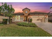 Beautiful single-Gathering home with landscaping at 26720 Weiskopf Dr, Englewood, FL 34223