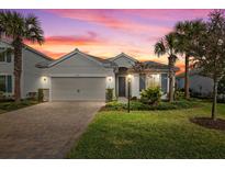 Beautiful one-story home with a two-car garage and a nicely landscaped lawn at 3314 Chestertown Loop, Bradenton, FL 34211