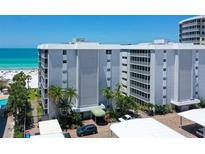 Oceanfront building with parking and beach access at 6312 Midnight Pass Rd # 301S, Sarasota, FL 34242