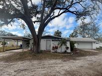 Ranch style home with carport and large detached garage at 4435 56Th Avenue E Ter, Bradenton, FL 34203