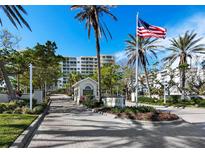 Gated entrance to a luxurious beachfront condominium community at 1800 Benjamin Franklin Dr # B408, Sarasota, FL 34236