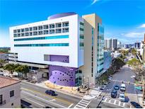 Modern building with parking and city views at 1990 Main St # 6, Sarasota, FL 34236