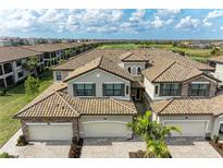 Aerial view of luxury homes with golf course views at 6086 Worsham Ln # 102, Bradenton, FL 34211