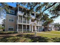 Inviting condo complex featuring screened porches, manicured landscaping, and a welcoming entrance, perfect for relaxed living at 4802 51St W St # 613, Bradenton, FL 34210