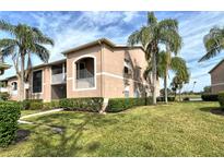 Charming two-story condo with lush landscaping, screened in porch and beautiful curb appeal at 5251 Mahogany Run Ave # 526, Sarasota, FL 34241