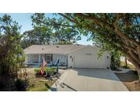 Charming single-story home with a two-car garage, well-kept lawn, and inviting curb appeal at 2760 Siesta Dr, Venice, FL 34293