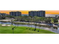 Beautiful beachfront condos overlooking a lush golf course and scenic river at 435 L Ambiance Dr # L807, Longboat Key, FL 34228