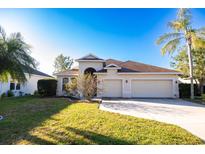 Inviting single-Gathering home with a spacious front lawn and a two-car garage at 5638 Oakshire Ave, Sarasota, FL 34233