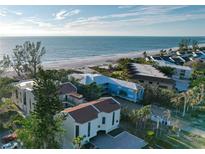 Aerial view of beach homes and condos with ocean view at 5611 Gulf Of Mexico Dr # 5, Longboat Key, FL 34228