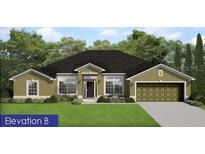 Charming one-story home with lush green lawn and a two-car garage at 507 San Ambrosio St, Punta Gorda, FL 33983
