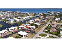 Aerial view of waterfront community, highlighting property location and nearby amenities at 311 Garvin St # 401A, Punta Gorda, FL 33950