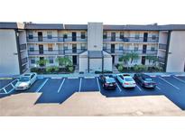 Two-story condo building with ample parking at 1999 Kings Hwy # 23C, Punta Gorda, FL 33980